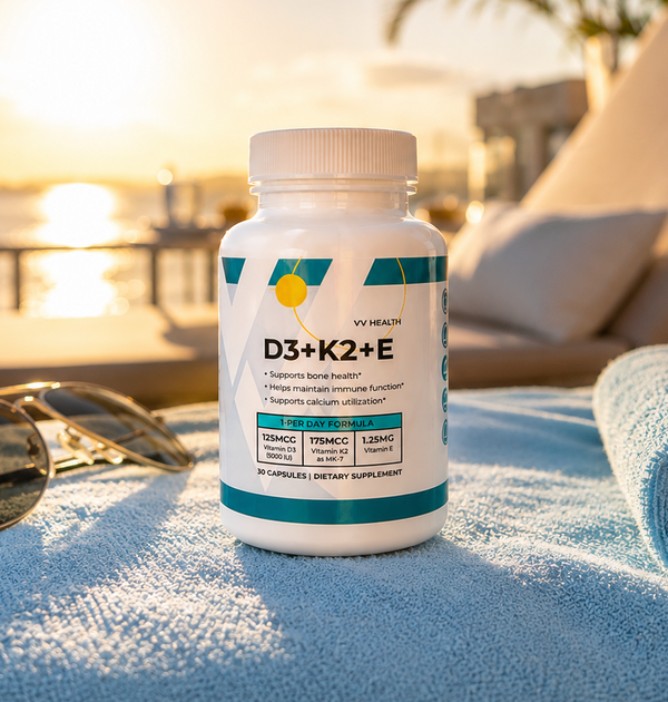 Supplement bottle labeled 'D3+K2+E' on a towel with sunglasses and a lounge chair by a poolside at sunset.